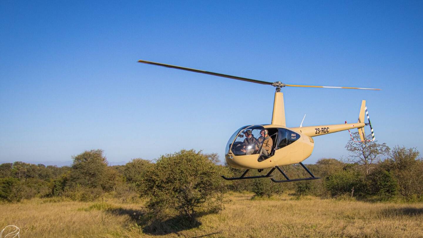 Helicopter flip in Hoedspruit in the bush with nature surrounding with Big Game heli services
