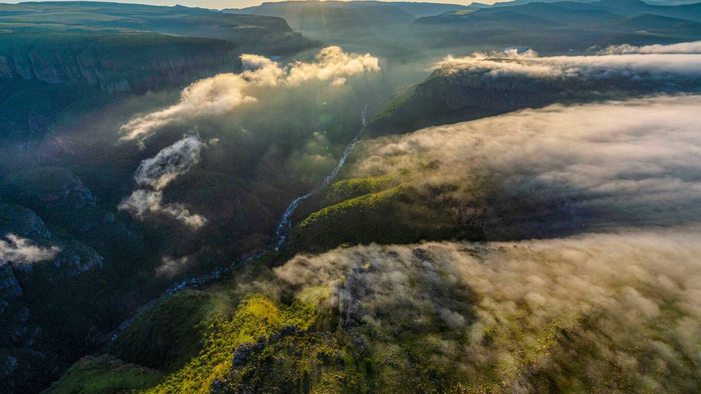 scenic flight by helicopter with big game heli services in bylde river canyon doing aerial photography